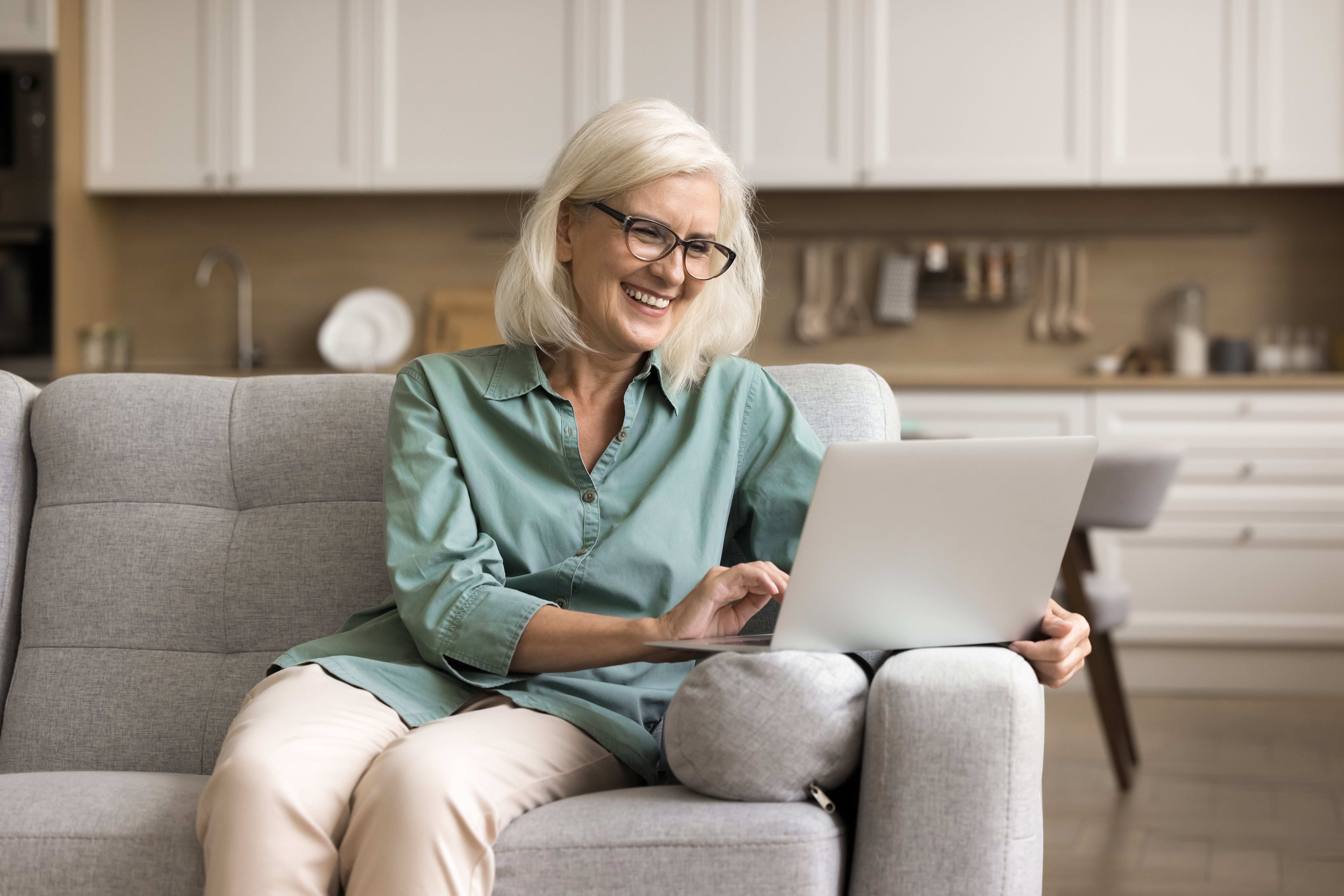 Woman Looking at Laptop